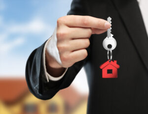 Estate agent holding a house key