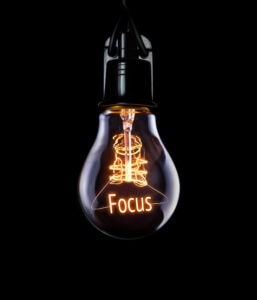 lightbulb with the word focus