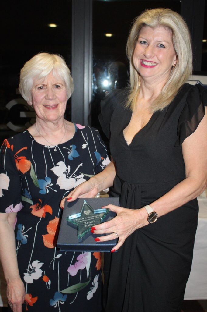 Anne Batty receiving an award