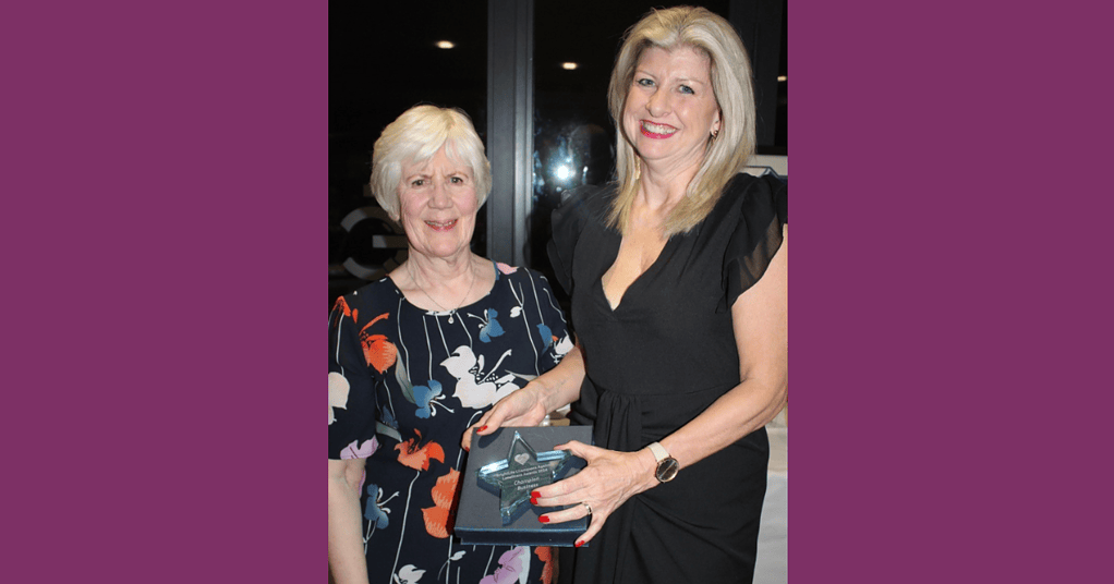 Anne Batty receiving an award