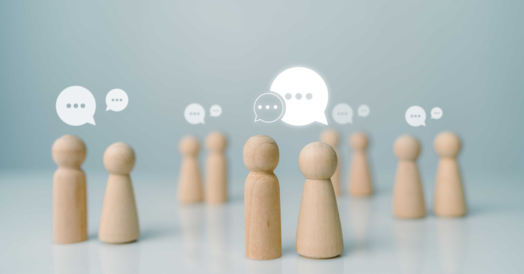 Wooden conical counters representing people having conversations