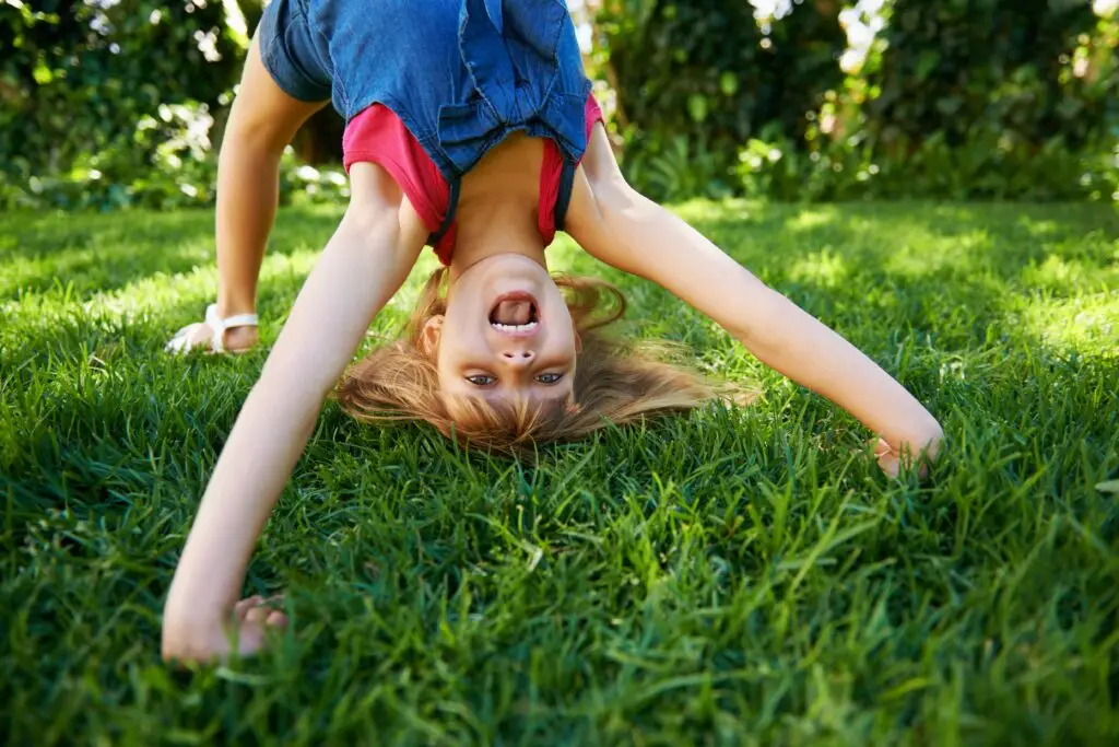 child doing actobatic poses